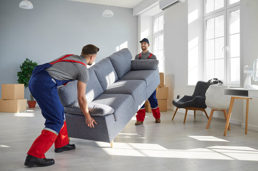 Shipping Made Simple: Movers setting up a Sofa